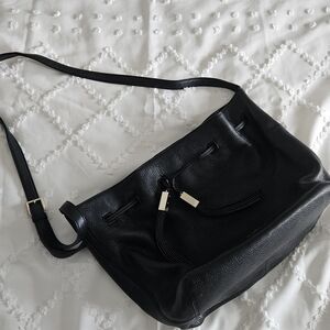 Black Leather Shoulder Bucket Bag with Tassel Accent